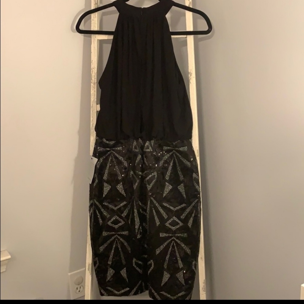 Black dress with sequins. Worn one time.